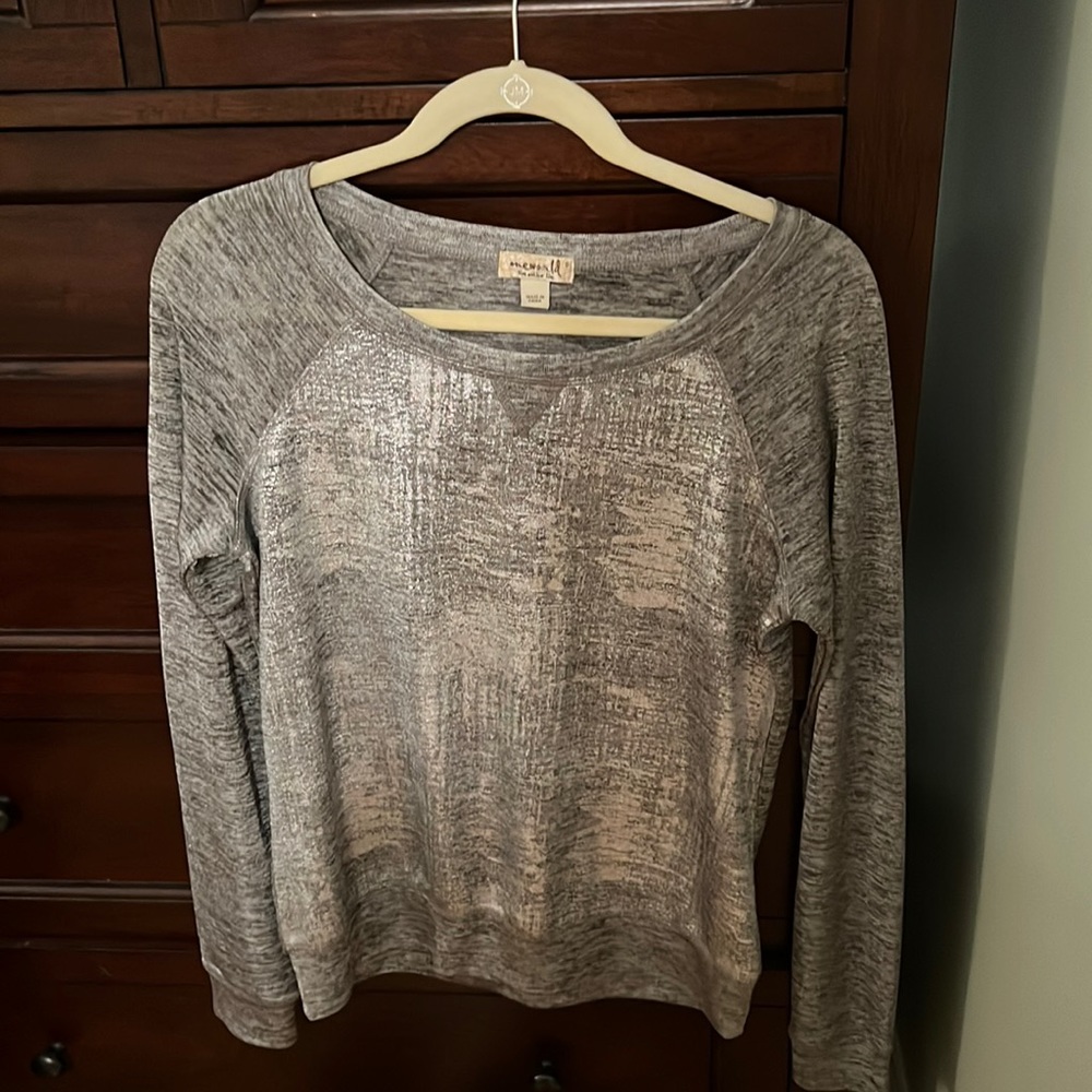 Gray/silver long sleeve top with silver accents all over the top.